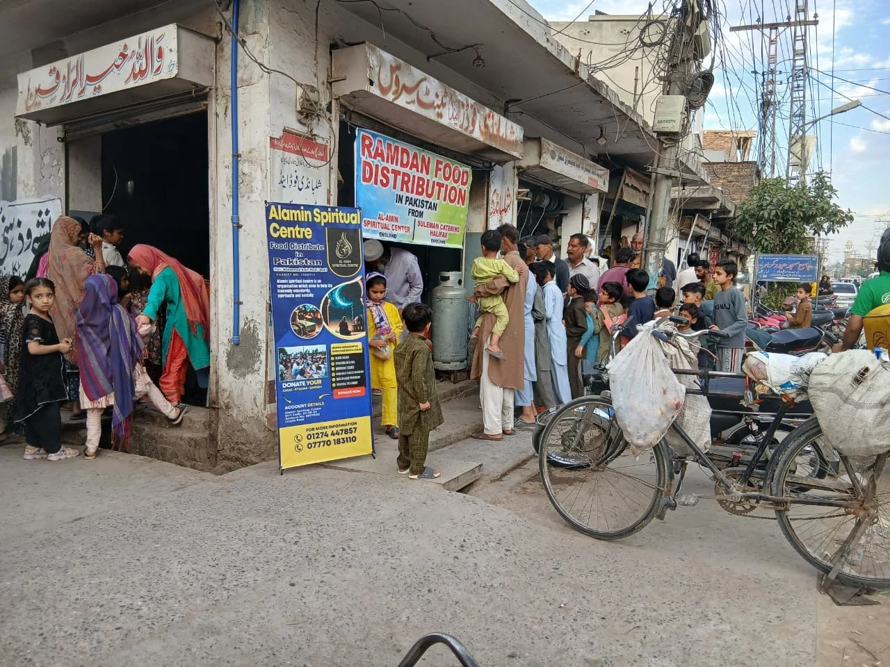 Families at one of Alamin’s Ramadan food distributions